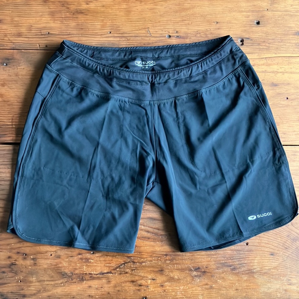 SUGOI running shorts NWOT